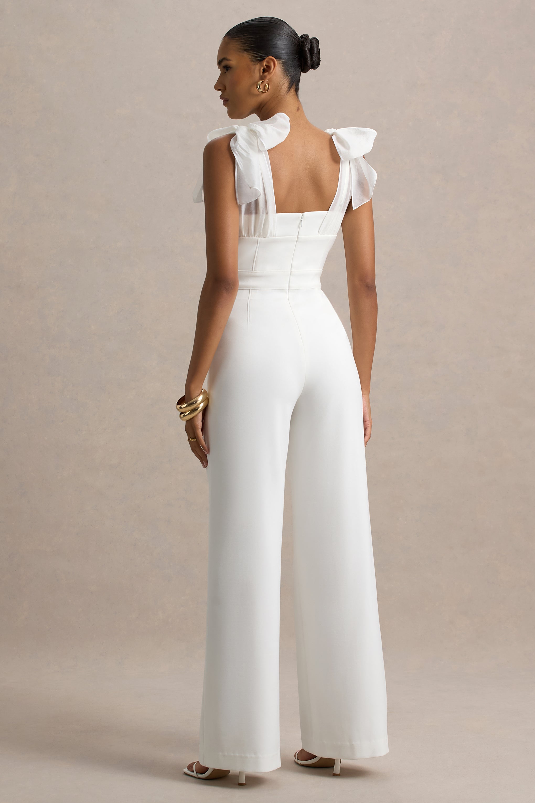 Seraphine London™ | White Flared-Leg Jumpsuit With Organza Bow Straps